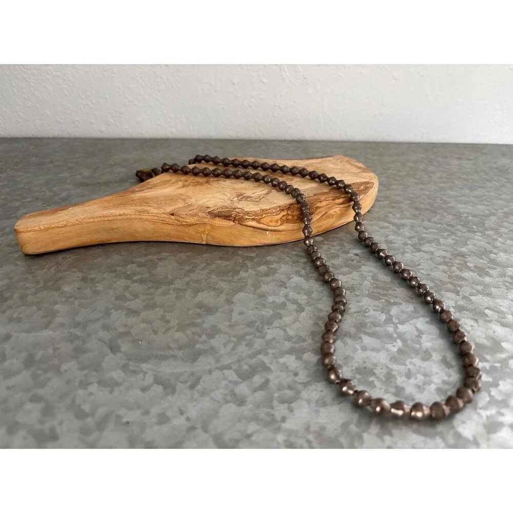 Vintage Hand Strung Metal Beaded Necklace Aged Copper Toned Beads Fiber Cord